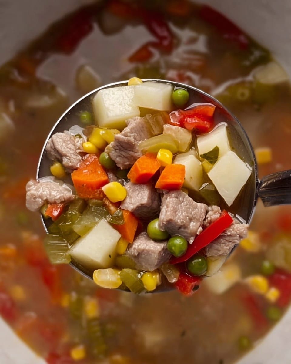 The image shows a close-up of a ladle lifting a portion of clear soup filled with multiple layers of small, cubed pieces. The bottom layer consists of small white potato cubes with a smooth texture. Mixed in are medium-sized chunks of light brown meat that have a tender look. There are bright orange carrot cubes scattered evenly, along with yellow corn kernels and green peas adding pops of color. Pieces of green celery stalks are visible, long and slightly firm looking. There are also bits of red bell pepper with a soft texture floating in the broth. The broth itself is light brown and clear, making all the ingredients visible beneath it. The soup sits in a white bowl against a white marbled texture background. photo taken with an iphone --ar 4:5 --v 7