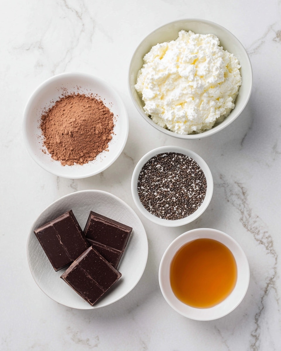 Five white bowls are placed on a white marbled surface. The top right bowl is filled with white cottage cheese with a lumpy texture. To the left of it, a bowl holds light brown cocoa powder with a soft, powdery look. Below the cocoa powder, another bowl contains three dark chocolate squares with a smooth, slightly dusty surface. In the middle right, a small bowl is filled with tiny black and white chia seeds, glossy and firm. The bottom right bowl holds a clear amber liquid, likely honey, smooth and shiny. Photo taken with an iphone --ar 4:5 --v 7