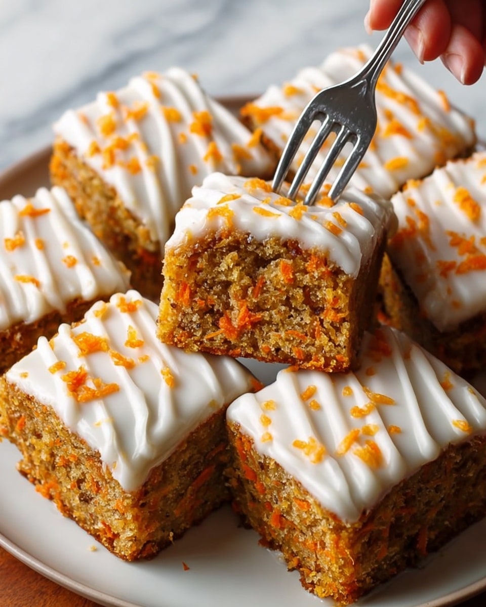 The image shows a close-up of a thick square slice of carrot cake with visible shredded orange carrot bits mixed throughout its dense golden-brown texture. It is topped with smooth white icing that drips down the sides in thick lines. There are small orange carrot pieces scattered on top of the icing. The cake sits on a white plate with a white marbled surface underneath. A silver fork is pressing into the front of the slice, with a woman's hand holding the fork from above. More cake pieces with the same layers and topping are seen in the background, slightly out of focus. photo taken with an iphone --ar 4:5 --v 7