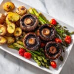 One-Pan Mushroom Steak Dinner with Roasted Potatoes, Asparagus, and Tomatoes Recipe