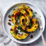 Roasted Acorn Squash with Raisins and Spiced Marinade Recipe