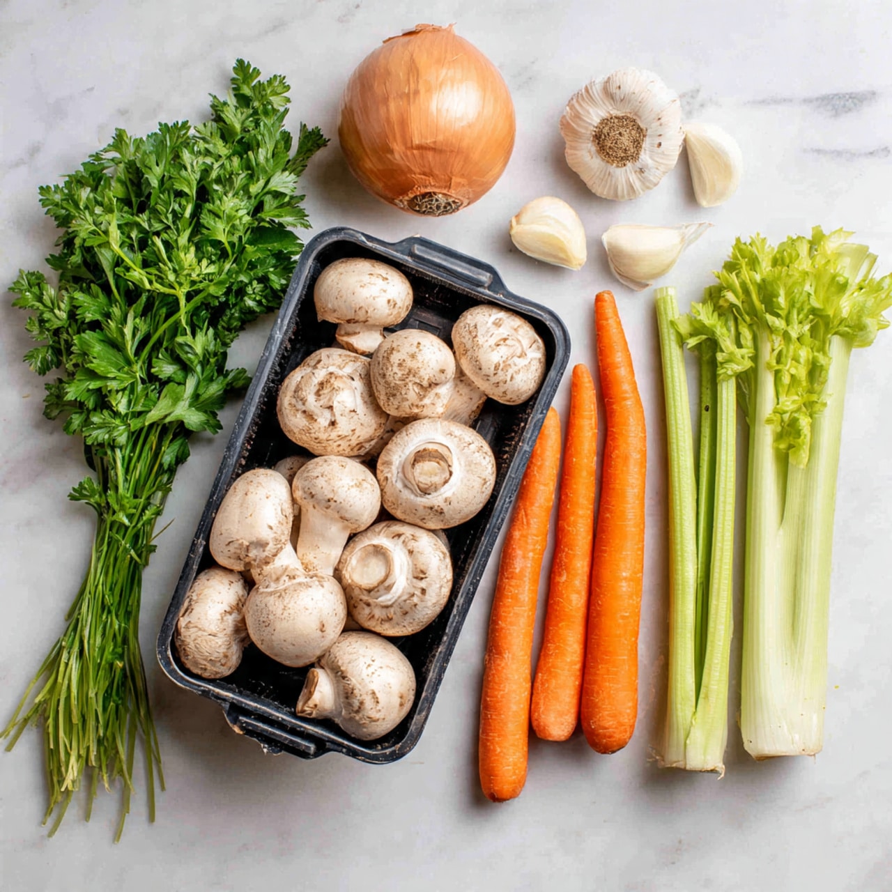 The image shows fresh vegetables and herbs arranged on a white marbled surface. At the center, there is a black plastic container filled with whole white mushrooms with smooth caps. To the left of the container, there is a bunch of fresh green parsley with leafy stems and above it a round brown onion with dry skin. To the right of the mushrooms, two long orange carrots with a rough texture are placed side by side, and above them, three cloves of peeled garlic are scattered. On the far right, long pale green celery stalks with leafy tops stand upright. The colors are vibrant and the scene is well lit, giving a fresh and clean look. Photo taken with an iphone --ar 4:5 --v 7