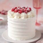 Pink Velvet Buttermilk Cake with Fluffy Whipped Cream and Raspberry Garnish Recipe