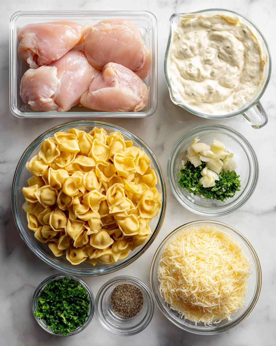 The image shows a flat layout of six ingredients on a white marbled surface. In the top left corner, there is a clear plastic container with three pieces of raw chicken, pinkish in color, with smooth texture. To the right, there is a clear glass measuring cup filled with creamy white alfredo sauce, smooth and glossy on the surface. Below the chicken, a clear glass bowl holds a large amount of yellow tortellini pasta, tightly folded, with a slightly rough texture. In the center, a small clear glass bowl contains bright green chopped parsley with a fresh, leafy texture. To the right of parsley, there are two smaller clear glass bowls; one has finely minced garlic which is off-white and slightly chunky, and the other has coarse black pepper with a granular texture. At the bottom right, a clear glass bowl contains shredded parmesan cheese, pale yellow and finely grated. All items are neatly arranged and labeled with black tags and white text. Photo taken with an iphone --ar 4:5 --v 7