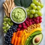 St. Patrick's Day Colorful Snack Board with Rainbow, Pot of Gold, and Festive Veggie Shapes Recipe