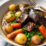 Traditional Irish Lamb Stew with Carrots, Potatoes, and Herbs Recipe