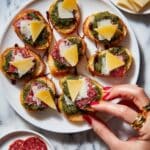Pesto Crostini with Parmesan & Soppressata Recipe