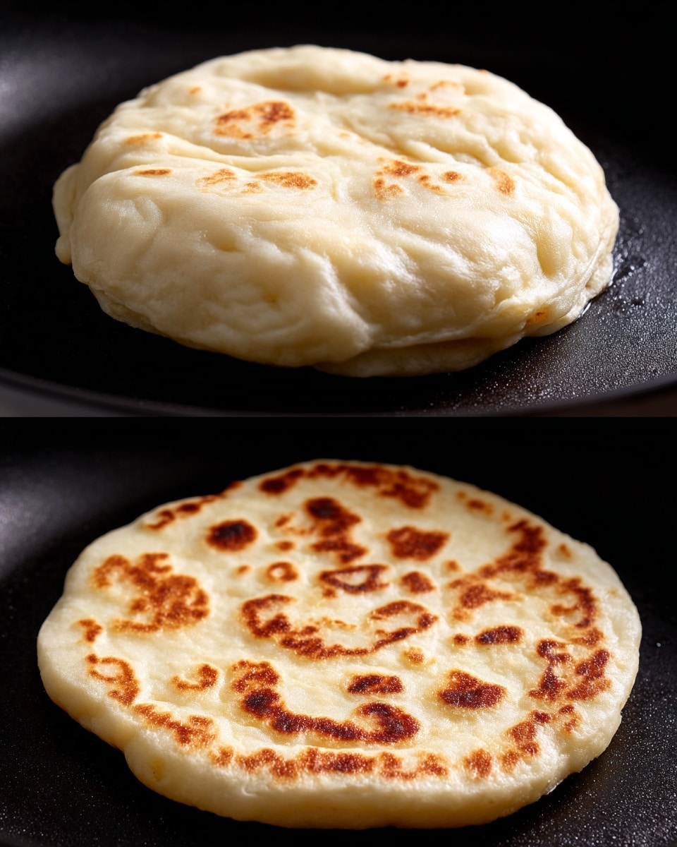 The image shows two stages of cooking flatbread in a black pan. The top part displays a thick, puffed-up dough piece with a pale beige color and a smooth, slightly shiny surface. It looks soft and airy, with subtle folds around the edges. The bottom part shows the same flatbread cooked flat, with a light golden-brown spotted pattern across its cream-colored surface. The bread is thin, round, and has a matte texture with some toasted spots adding visual contrast. The background is a black pan contrasting the dough’s light color. photo taken with an iphone --ar 4:5 --v 7