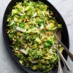 Shaved Brussels Sprouts Salad with Dates, Almonds, and Romano Cheese Recipe