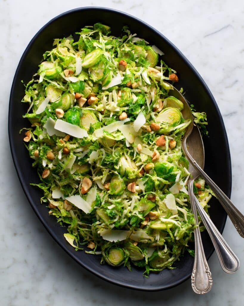 Shaved Brussels Sprouts Salad with Dates, Almonds, and Romano Cheese Recipe