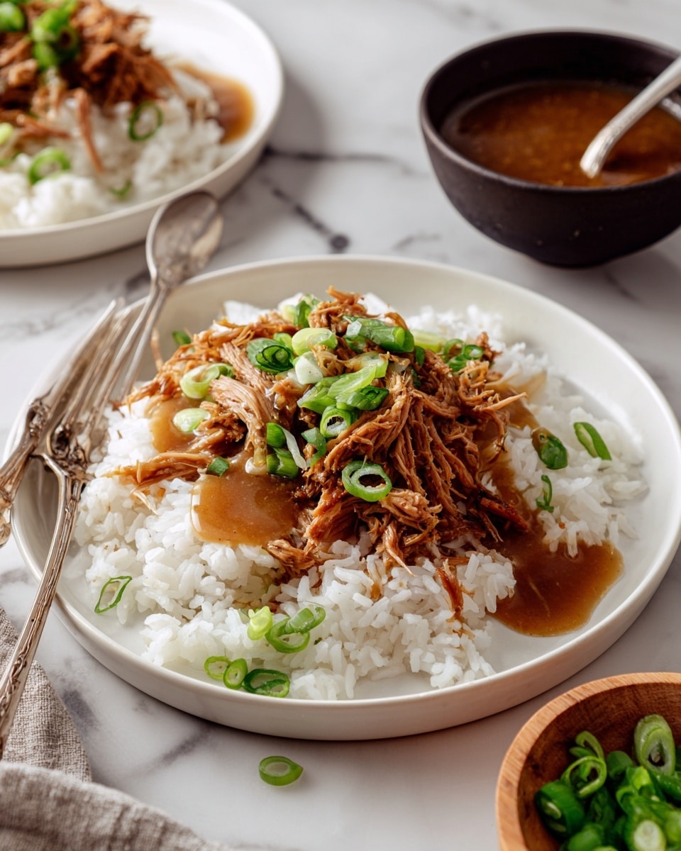 A white plate holds a serving of white rice as the base layer, topped with shredded, brown meat scattered unevenly across, and covered partially by a thick, light brown sauce with a smooth texture. Bright green sliced scallions are sprinkled on top, adding a fresh color contrast. A silver fork rests on the left side of the plate, partially on the rice. The plate is placed on a white marbled surface. Next to it, another white plate with rice and shredded meat is visible, along with a dark bowl of brown sauce with a spoon and a wooden bowl holding more sliced green scallions. photo taken with an iphone --ar 4:5 --v 7