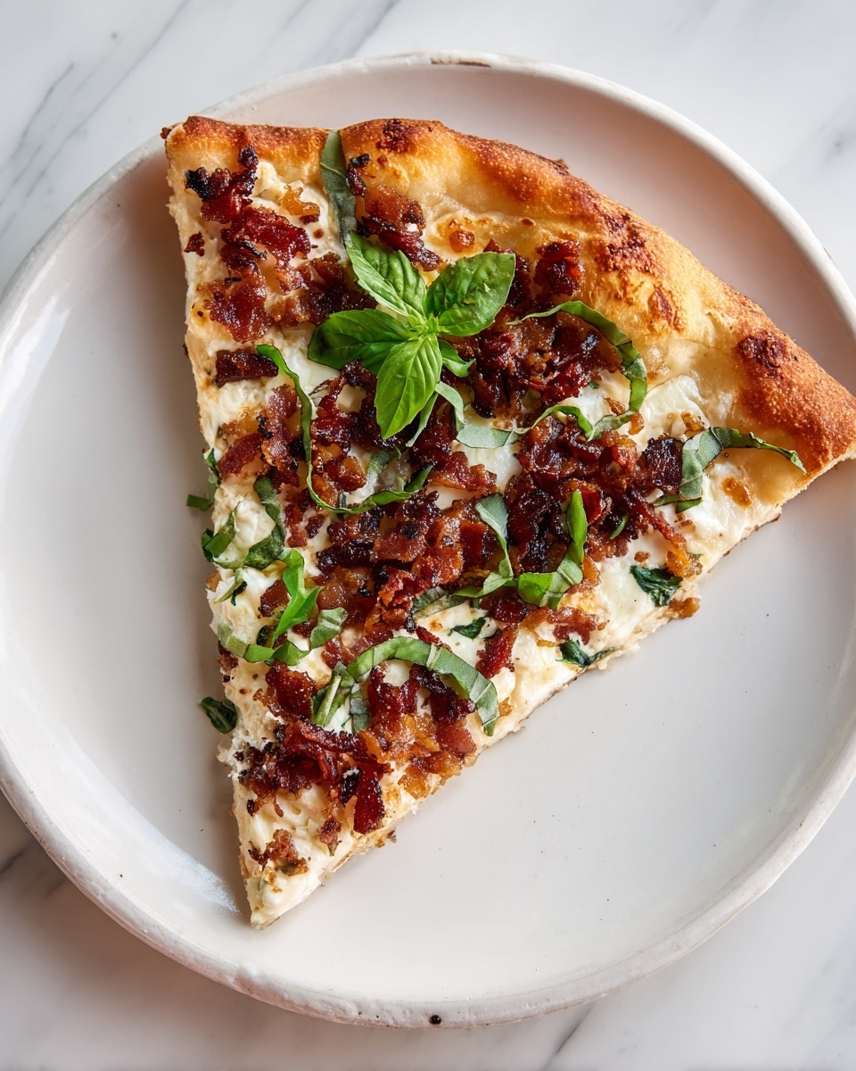A single slice of pizza is placed on a white plate with a slightly rough texture. The pizza has three visible layers: the bottom layer is a thick, light golden crust with soft texture, the middle layer is melted white cheese covering the crust, and the top layer includes dark reddish-brown crispy bacon pieces, caramelized brown onions, and fresh green basil leaves scattered on top. The plate sits on a white marbled surface. photo taken with an iphone --ar 4:5 --v 7