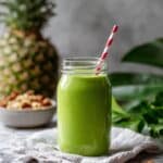 Tropical Smoothie with Coconut Water, Mango, Pineapple, and Spinach Recipe