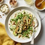 Charred Zucchini Salad with Microgreens, Feta, and Hazelnuts Recipe