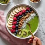 Creamy Green Smoothie Bowl with Mango, Banana, and Toppings Recipe