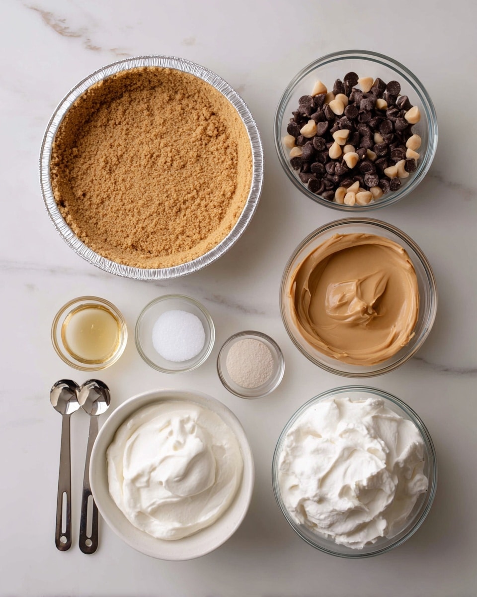 The image shows all ingredients arranged neatly on a white marbled surface for making a peanut butter dessert with a pre-made graham cracker crust. At the top left is a round graham cracker crust in an aluminum tin with a pale brown color and crumbly texture. To the right are two clear glass bowls; the first bowl has a mix of dark brown and light brown chocolate chips, and the second bowl contains smooth, creamy peanut butter in a light brown shade. Below these, there are three metal measuring spoons; the first spoon has white coconut oil, the second has light beige almond milk, and the third has white confectioners sugar. At the bottom left is a clear glass bowl filled with thick, white vegan cream cheese. To the right of it is a white bowl filled with fluffy, smooth vegan whipped cream. All items are spaced out evenly, highlighting individual textures and colors. Photo taken with an iphone --ar 4:5 --v 7