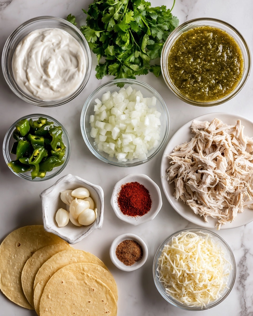 The image shows several small clear and white bowls placed on a white marbled surface, each containing different ingredients for a dish. At the top left is a clear bowl filled with thick white sour cream, beside it is a bunch of fresh green cilantro leaves. To the right is a clear bowl with green salsa verde sauce that has a slightly chunky texture. Below the cilantro is a small white bowl with green chilies that are diced. Below the salsa verde is a small white bowl filled with white diced onions. To the right of the onions is a white plate holding small piles of seasoning powders in red, brown, and white colors next to peeled garlic cloves. Below the onions is a white bowl filled with shredded white cheese. To the right of the cheese is a clear bowl full of shredded cooked chicken, light brown in color. On the left side near the bottom are three stacked light yellow tortillas. The setup is neat, colorful, and shows the raw ingredients clearly. Photo taken with an iphone --ar 4:5 --v 7