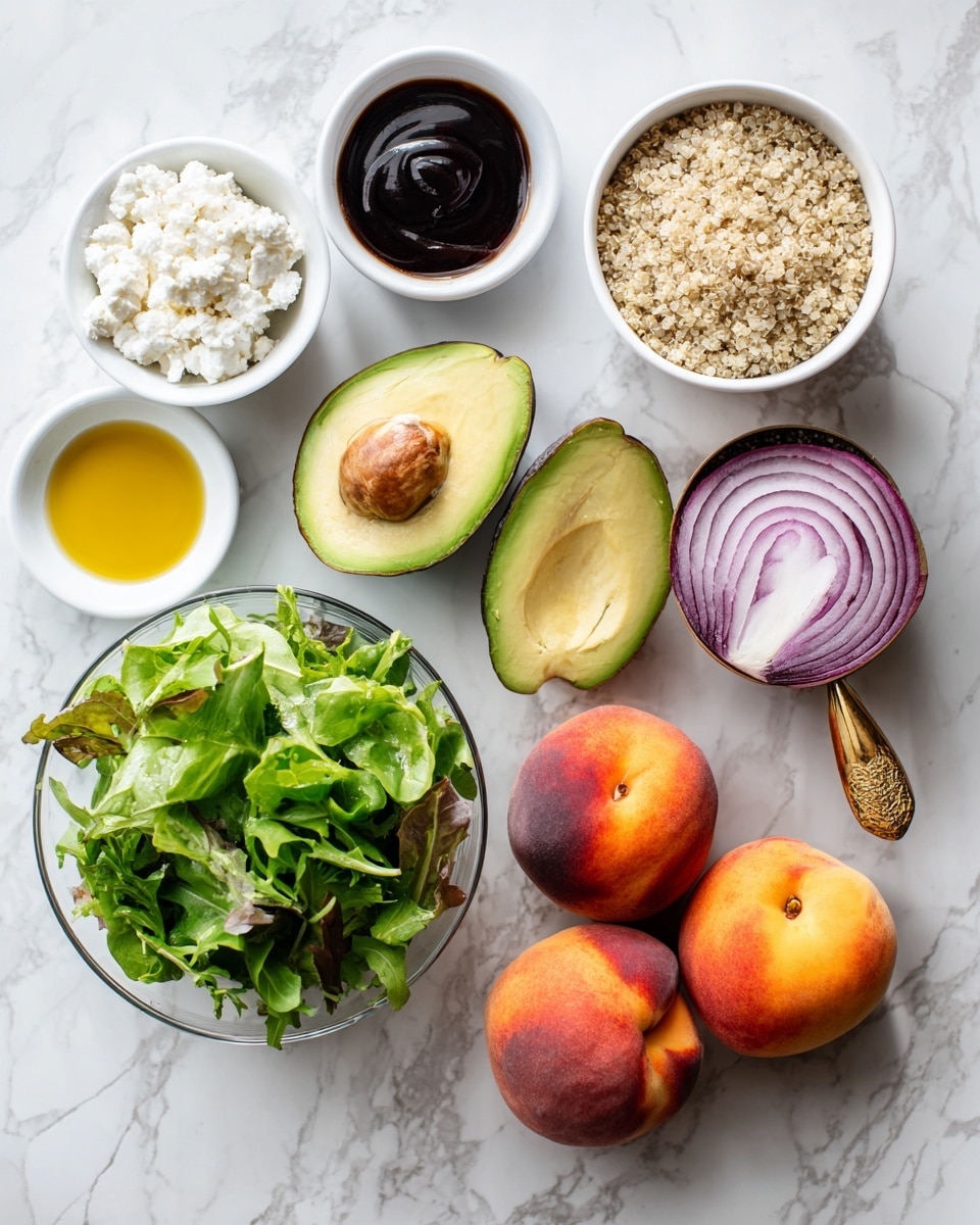 A collection of salad ingredients on a white marbled surface, including a clear bowl filled with bright green mixed leafy greens at the bottom left, a small white bowl of crumbled white feta cheese above it, a small white bowl with dark brown balsamic glaze to the top left, a small white bowl with golden yellow oil near the center, a small white bowl with salt and pepper near the top center-right, a gold measuring cup filled with beige quinoa to the top right, a red onion sliced in half with purple and white rings right below the quinoa, one avocado sliced in half showing its bright green inside and brown seed near the top center and bottom center, and three whole peaches or nectarines with orange, red, and yellow tones stacked at the bottom right; the image is bright and clean, photo taken with an iphone --ar 4:5 --v 7