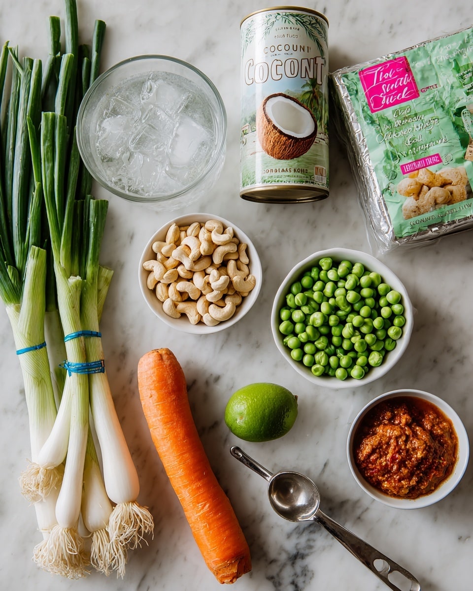 The image shows several cooking ingredients arranged on a white marbled surface. On the left, there is a clear glass measuring cup filled with water and beside it a bunch of green onions tied with blue rubber bands, showing fresh white bulbs and long green stalks. Above the measuring cup, a can of coconut milk stands upright with a label showing a halved coconut. To the right of the can, there are three small white bowls: one with light brown sugar, one with shelled cashew nuts, and another filled with frozen green peas covered in frost. A fresh whole carrot lies horizontally near the bottom, bright orange and smooth. Next to the carrot, a tablespoon filled with red curry paste is placed with a metal scoop handle visible. Above the carrot and curry paste, a wrapped package of extra firm tofu is seen with green and pink labeling. A whole lime is placed near the upper right area. Each ingredient is tagged with a pink label describing its name. The photo taken with an iphone --ar 4:5 --v 7