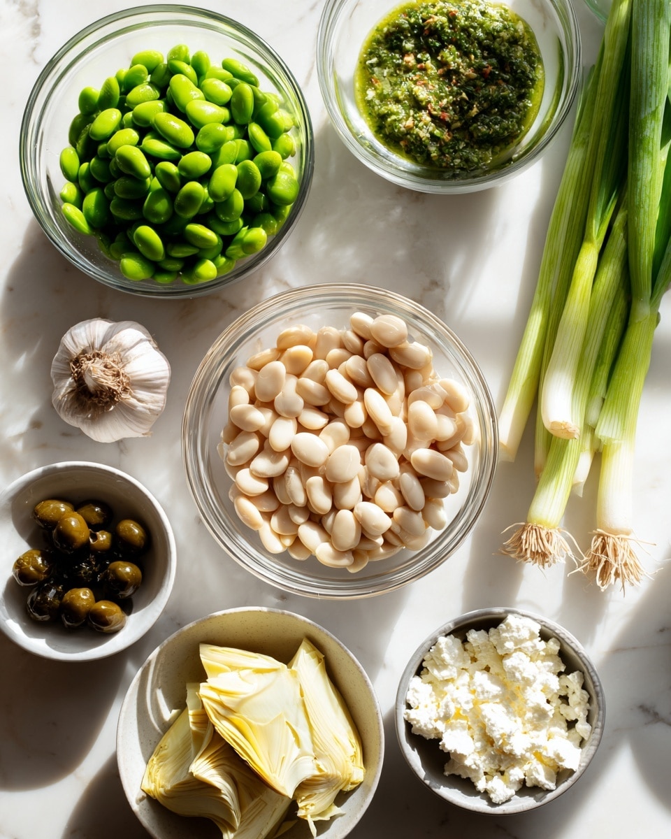 The image shows clear glass bowls with different ingredients on a white marbled surface. At the top left, a bowl full of bright green edamame beans, next to it on the right is a bowl with a green herb dressing. In the center, a large bowl of pale white beans sits with a bunch of long green scallions next to it on the right side. Below the beans is a bowl of white crumbly feta cheese. On the left side at the bottom, a bowl holds pale yellow artichoke pieces, with a small white bowl of dark green capers beside it. A whole garlic bulb is visible near the top left, and a small white bowl of light brown pine nuts appears on the right edge near the scallions. The bright natural light creates clear shadows and reflections on the surface and bowls. photo taken with an iphone --ar 4:5 --v 7