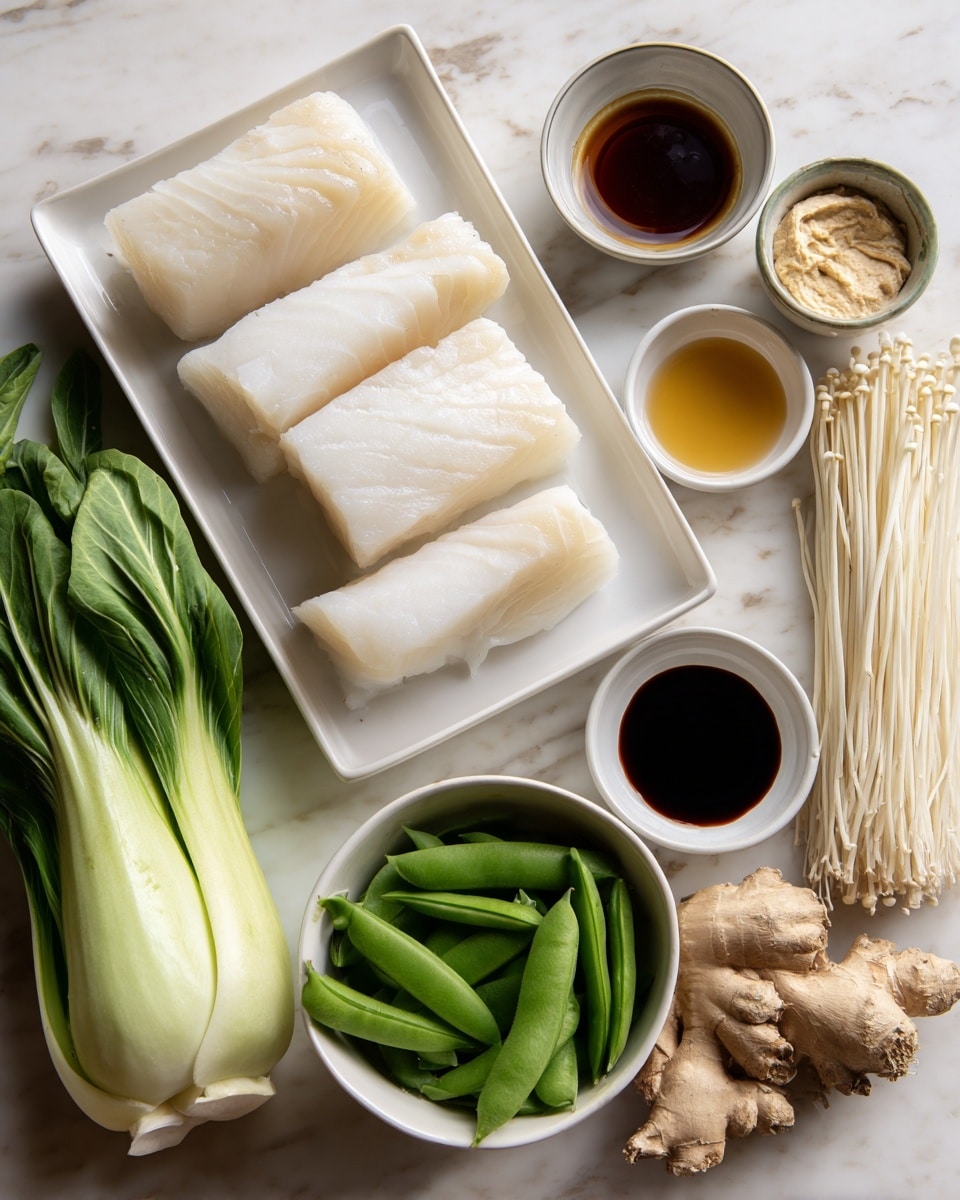 The image shows fresh ingredients arranged neatly on a white marbled texture. In the center is a white rectangular dish holding four pieces of raw black cod, which are white and smooth with a slight shine. Surrounding the fish are small white bowls containing light brown white miso paste with a creamy texture, light amber sesame oil, clear light yellow sake, dark brown soy sauce, pale beige mirin, and white granulated sugar. Below the fish dish, there is a small white bowl filled with bright green snap peas. To the right of the peas is a bundle of thin, off-white enoki mushrooms standing upright, with long stems and tiny caps. Fresh green vegetables including bok choy with white stems and leafy green tops, green scallions with white bulbs, and a piece of fresh light brown ginger root are arranged at the bottom. The arrangement is clean and organized, with a soft natural light. Photo taken with an iphone --ar 4:5 --v 7