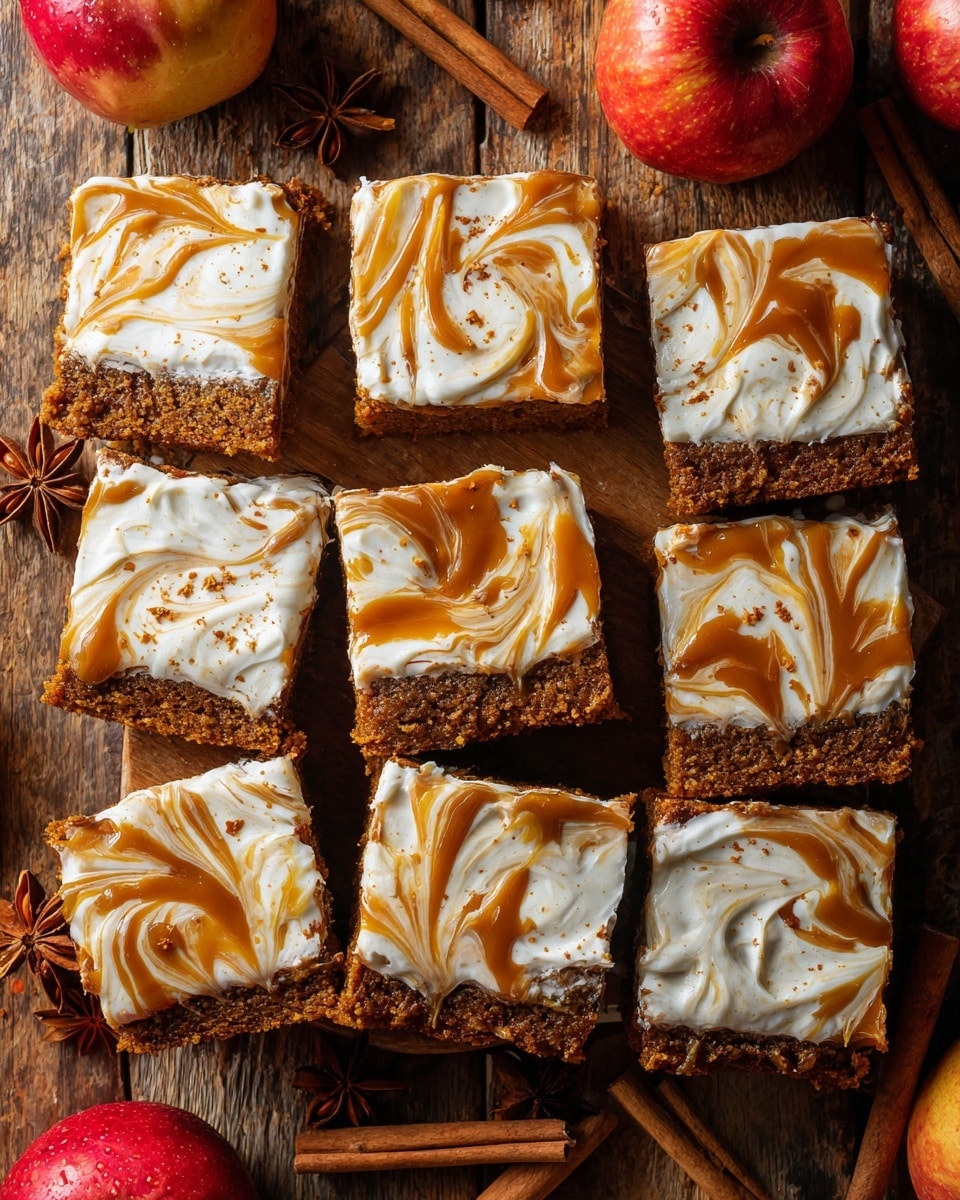 The image shows nine square pieces of carrot cake arranged closely together, each topped with two visible layers: a moist, brown carrot cake base with a rough texture, and a thick, creamy white frosting layer swirled with caramel-colored sauce on top, creating a marbled effect. The frosting looks smooth and slightly glossy with small specks of spice sprinkled over it. The cake sits on a rustic wooden surface with cinnamon sticks, star anise, and red apples nearby, adding warm, autumnal colors to the scene. photo taken with an iphone --ar 4:5 --v 7
