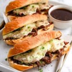 French Dip Sandwiches with Juicy Roast Beef and Cheesy Au Jus Recipe